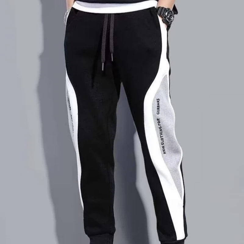 Pantalones deportivos negros de estilo hip hop para hombre, holgados, informales, elásticos y con cordón