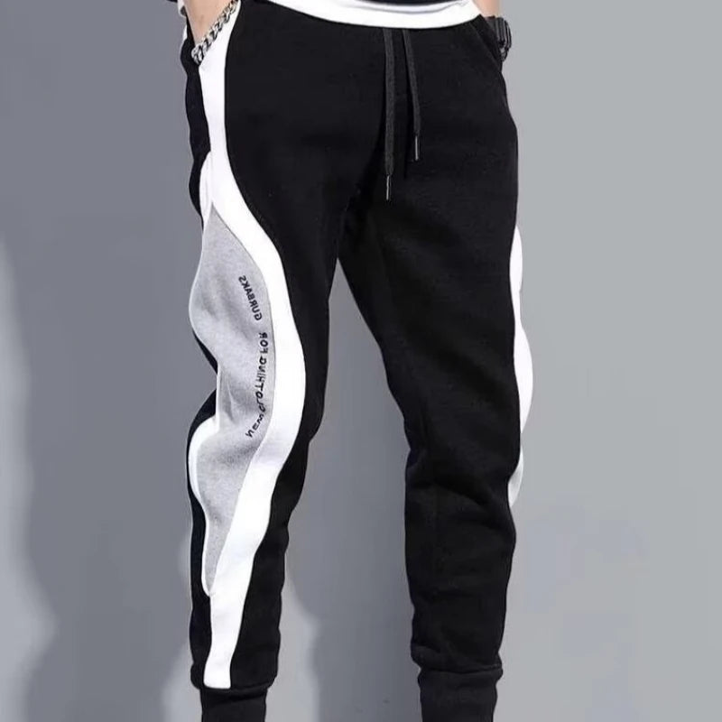 Pantalones deportivos negros de estilo hip hop para hombre, holgados, informales, elásticos y con cordón