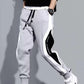 Pantalones deportivos negros de estilo hip hop para hombre, holgados, informales, elásticos y con cordón