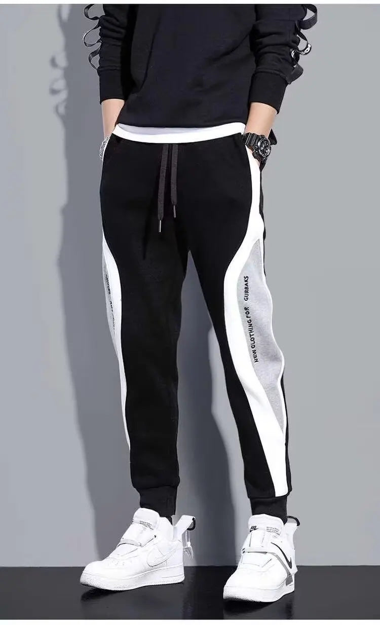 Pantalones deportivos negros de estilo hip hop para hombre, holgados, informales, elásticos y con cordón