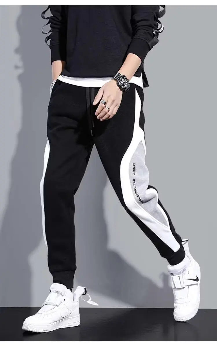 Pantalones deportivos negros de estilo hip hop para hombre, holgados, informales, elásticos y con cordón