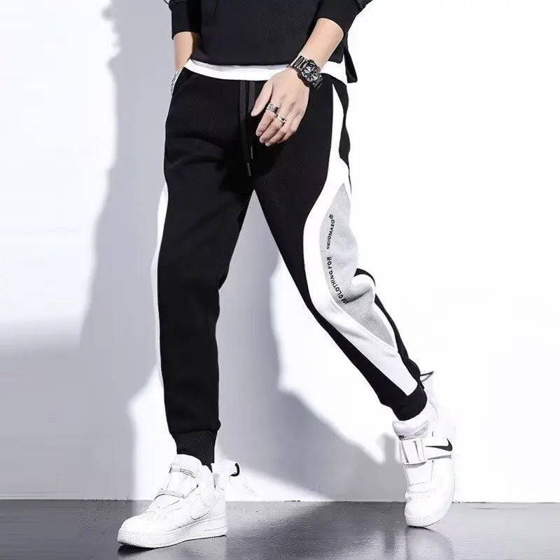 Pantalones deportivos negros de estilo hip hop para hombre, holgados, informales, elásticos y con cordón