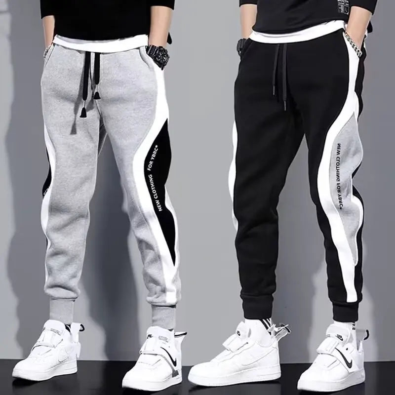 Pantalones deportivos negros de estilo hip hop para hombre, holgados, informales, elásticos y con cordón