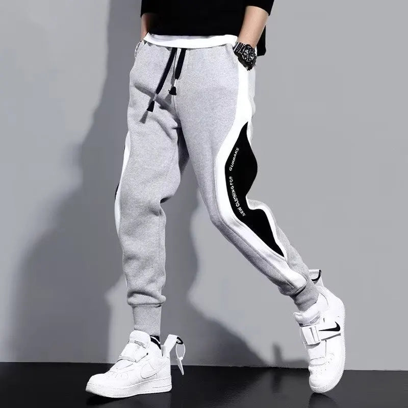 Pantalones deportivos negros de estilo hip hop para hombre, holgados, informales, elásticos y con cordón