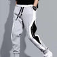 Pantalones deportivos negros de estilo hip hop para hombre, holgados, informales, elásticos y con cordón