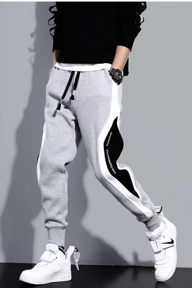 Pantalones deportivos negros de estilo hip hop para hombre, holgados, informales, elásticos y con cordón