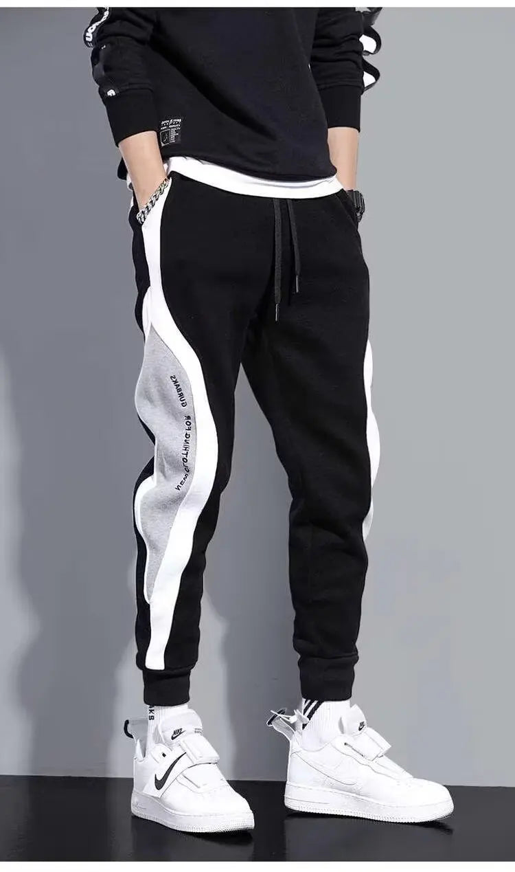 Pantalones deportivos negros de estilo hip hop para hombre, holgados, informales, elásticos y con cordón