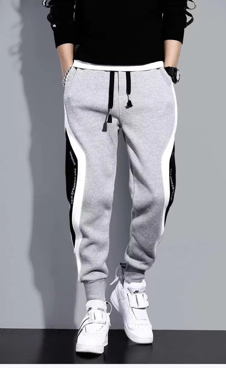 Pantalones deportivos negros de estilo hip hop para hombre, holgados, informales, elásticos y con cordón