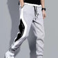 Pantalones deportivos negros de estilo hip hop para hombre, holgados, informales, elásticos y con cordón