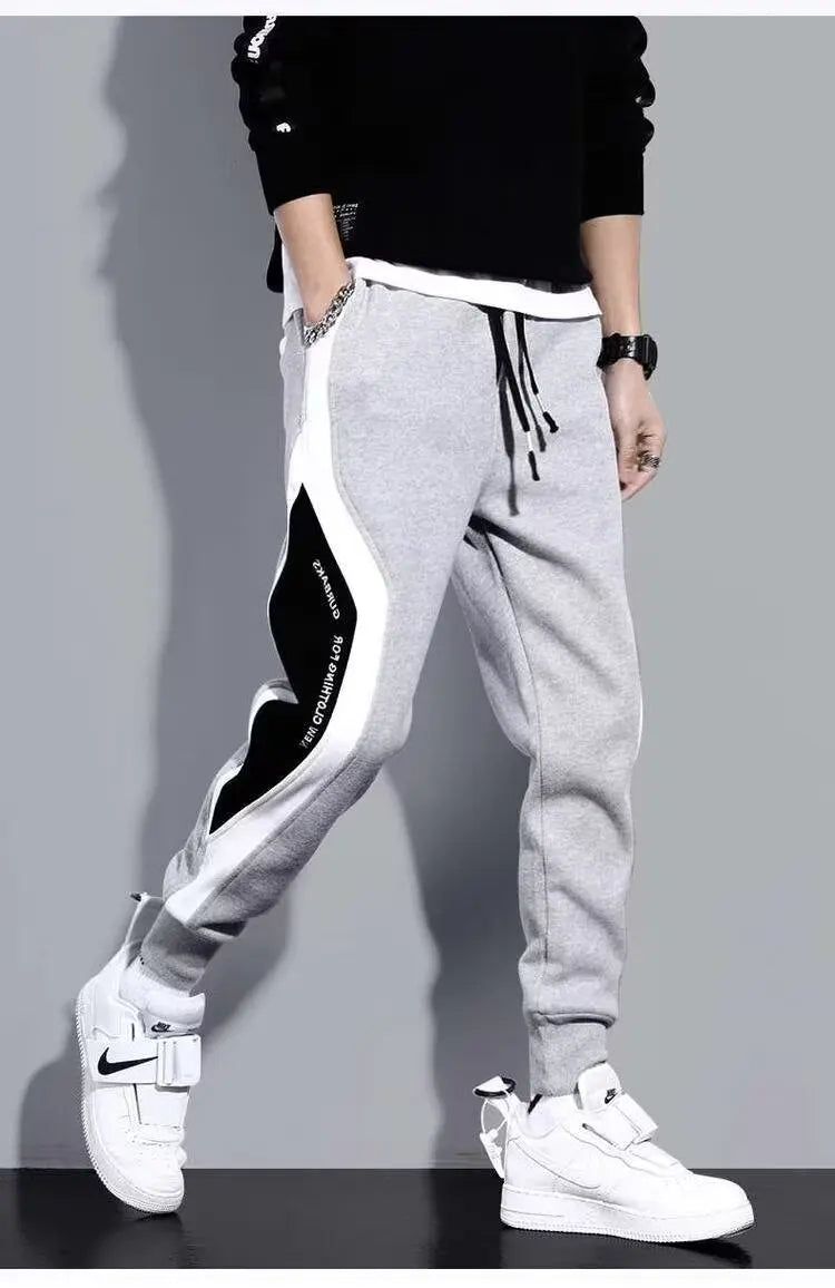 Pantalones deportivos negros de estilo hip hop para hombre, holgados, informales, elásticos y con cordón